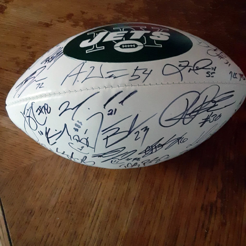 NY Jets Team Autographed Football! Includes: 2 Jets Pilsner