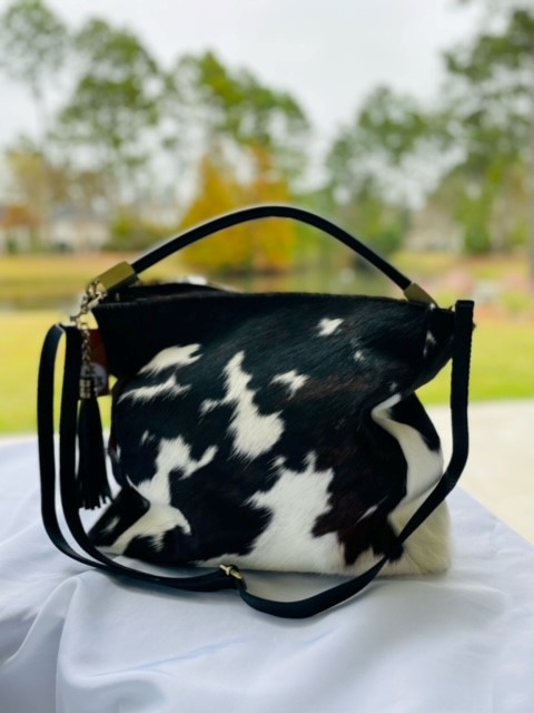 Black and discount white cowhide purse